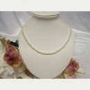7099/ Culture Pearl strand - button-shaped, satin white,...