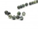 Eight pierced green jasper beads