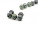 Five pierced green jasper beads