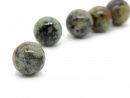 Pierced darker turquoise beads