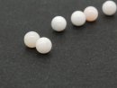 Two pale pink opal spheres