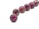 Faceted, pierced ruby bead