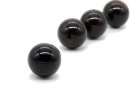 Pierced, dark agate sphere