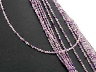Pierced, purple-coloured fluorites with facets