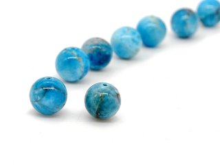 Two pierced blue apatite beads