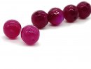 two magenta agate beads