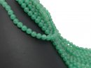 Pierced green aventurine spheres