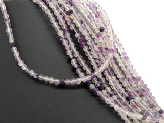 Pierced, purple fluorite beads