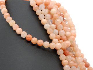 Orange-coloured, pierced calcite