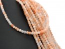 Orange-coloured, pierced calcite