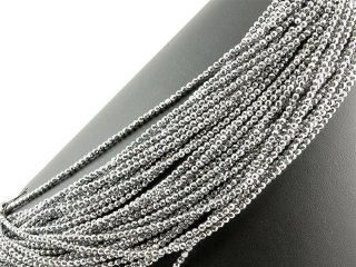 Shiny spheres of hematite in grey