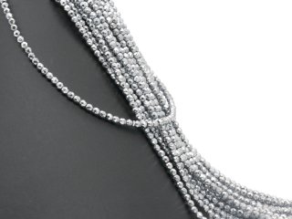 Shiny spheres of hematite in grey