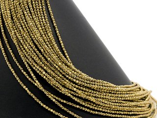 Pierced, sparkling, golden haematite spheres