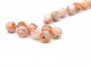 Eight patterned pierced jasper beads