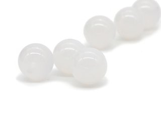 Three white pierced agate beads