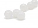 Three white pierced agate beads