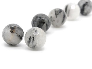 Two faceted, pierced gemstone beads