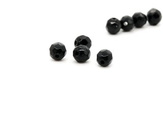 Quatre perles de tourmaline noire