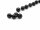 Four black pierced tourmaline beads