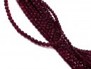 Strand of agate beads in magenta