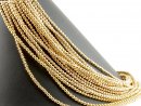 Pierced, sparkling, golden haematite spheres
