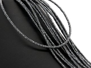 Pierced, faceted hematite rondels in grey