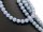 Large, pierced, angelite beads in blue