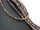 Patterned, pierced rondels made of jasper in shades of brown and grey