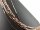 Pierced, angular rose gold haematite rods