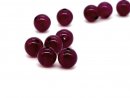 Five pierced magenta agate beads