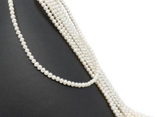 Perles de culture blanches ovales percées