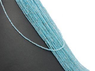 Pierced, small, faceted apatites in light blue