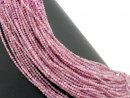 Faceted, pierced tourmaline beads in a muted lilac-pink...