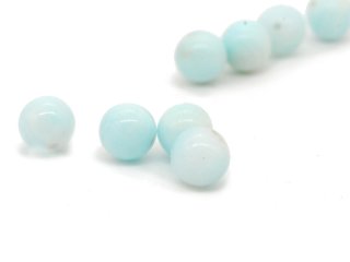 Four blue pierced hemimorphite spheres