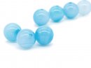 Three pierced blue agate beads