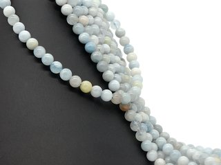 Light blue, pierced, large aquamarine beads