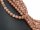 Pierced, pinkish-brown moonstone beads