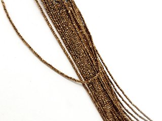 Pierced, faceted, small haematite beads in brown