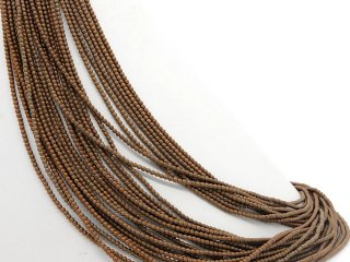 Petites boules dhématite percées de couleur brune