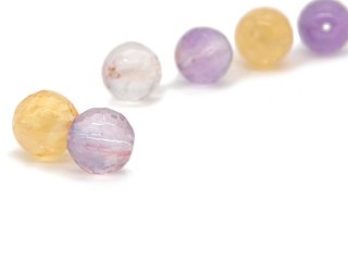 Two faceted ametrine beads