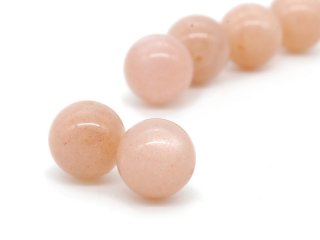 Two peach coloured moonstone beads