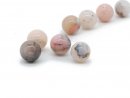 Four opal beads in multicolour