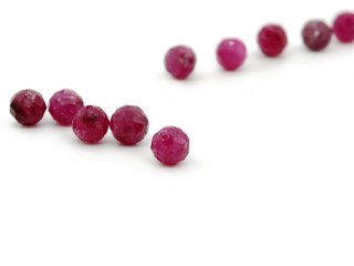 Five ruby beads