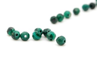Small, faceted malachite spheres