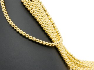 Durchbohrte, funkelnde, goldene Hämatit-Kugeln