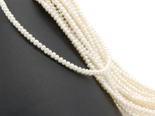 Pierced freshwater pearls for jewellery in white