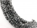 Tourmaline quartz strand - faceted discs 5 mm grey black,...