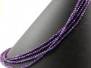 Pierced, faceted amethyst beads in purple