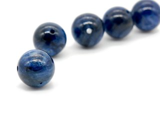 Dark blue pierced kyanite ball