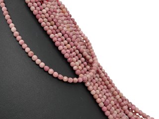 Perles de rhodonite roses, percées et facettées